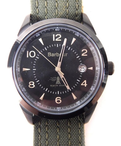 A Barbour gent's wristwatch, with a Swiss movement, Beacon Brand, in a black case, water resistant, 4cm diameter, on a brown material strap, boxed.