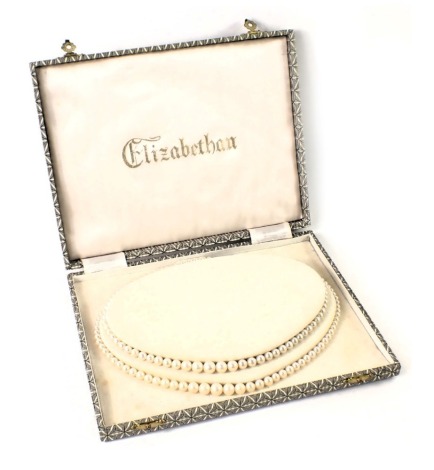 A cultured pearl two strand necklace, with a woven clasp set with marquisette two layer design in Elizabethan box.