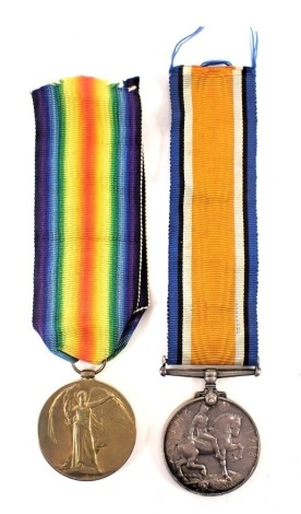 Two WWI medals, comprising civilisation medal and defence medal, each marked 31063 PTE A.E Crutchley North NR, with ribbons.