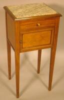 An Edwardian mahogany box wood sprung bedside cabinet with a variegated green and white marble top