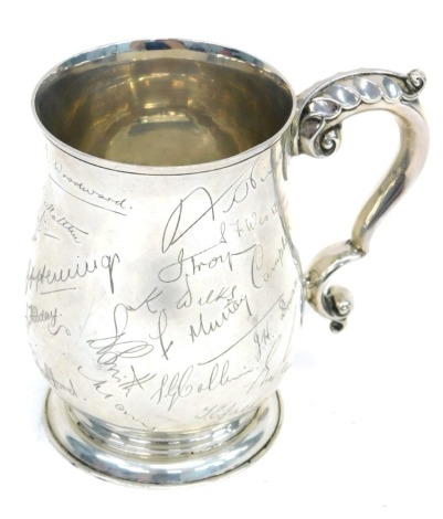 A George VI silver baluster tankard, engraved signatures, Birmingham 1947, 10oz, 12cm high.