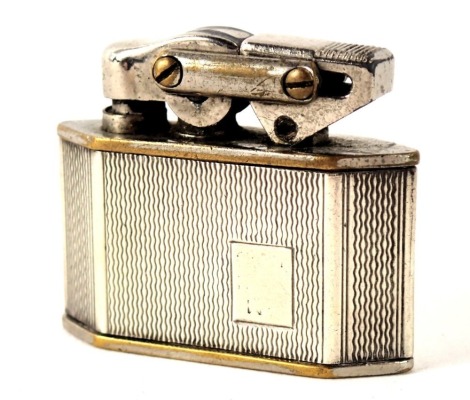 An Elisorn lighter, with white metal casing stamped silver, 3cm high.