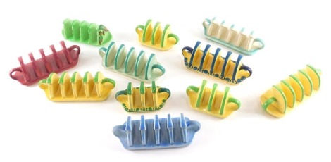 A quantity of Carltonware Art Deco toast racks, in shades of green, yellow, blue, red, etc.