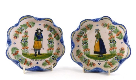 A pair of early 19thC HR Quimper fluted faience cabinet plates, each polychrome decorated with central figure in flower garden, signed HR Quimper, 15cm diameter.