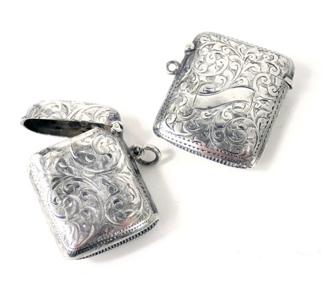 Two Edward VII silver Vesta cases, comprising a Jeff Nolan, Birmingham 1904 engine engraved match case, and a Birmingham 1903 match case, 1.29oz. (2)