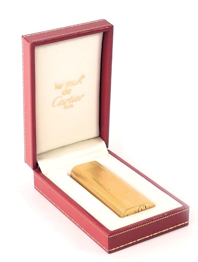 A Must De Cartier gold plated lighter serial number 89578 boxed