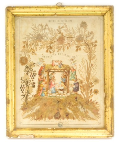 A late 19th/early 20thC collage, titled Fleur de Bethleem (Flowers of Bethlehem), with central printed manger, etc., 30cm x 23cm. (AF)