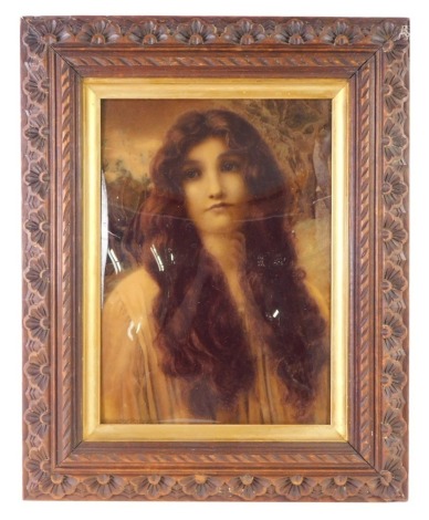 A late 19th/early 20thC crystoleum after Henry Ryland, depicting a Pre Raphaelite lady, 26cm x 18cm, in carved frame.