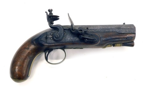 An early 19thC 12-bore flintlock pistol by Rogers, with ram rod and engraved brass trigger guard and pommel to the walnut stock, the lock plate engraved Rogers, the octagonal barrel with fore-sight, with bolt clip, 23cm long.