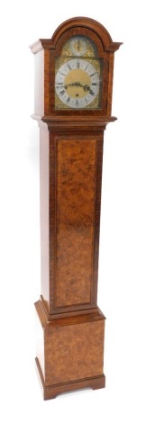 A grandmother clock with Westminster, Winchester and Wittington chimes, in a faux walnut case, 167cm high.