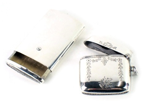 An Edward VIII silver match case, engraved to the interior With Compliments James McLean 12 Woodside Terrace Glasgow, with telephone, etc., Birmingham 1938, and a Vesta case, 2.47oz overall.