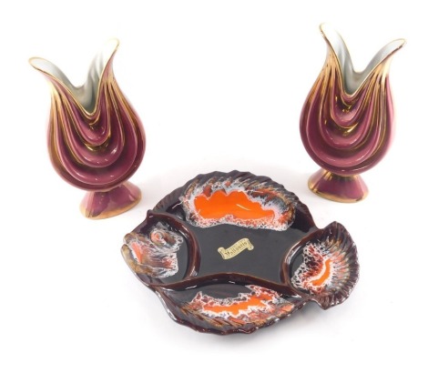 A 1960s Vallauris fish shaped platter, and a pair of Italian vintage red and gold vases.