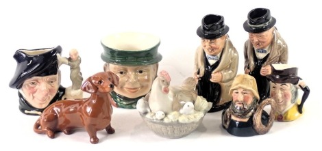 A group of ceramics, comprising an egg cup, two Royal Doulton Winston Churchill miniature character jugs, Staffordshire character jug The Fisherman miniature, Sylvac Mr Wolfe miniature character jug, a Beswick dachshund, a Nao hen in basket, and a small R