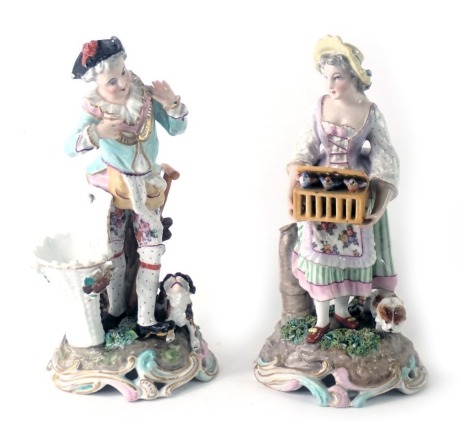 A pair of Dresden continental porcelain figures, comprising lady carrying basket of birds, and a gentleman with pheasant basket, 20cm and 21cm high. (2)