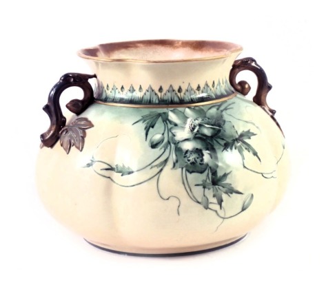 A Hadley's Worcester Faience bowl, with fluted top and transfer printed decoration of green flowers, with vine swag handles and purple stamp to underside, 11cm high.