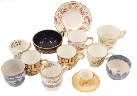 A group of 19thC and later ceramics, comprising a blush ivory style miniature cup and saucer, a Wedgwood willow pattern rice bowl, Nanking Cargo blue and white tea cup, two Royal Crown Derby coffee cans, etc. (a quantity)