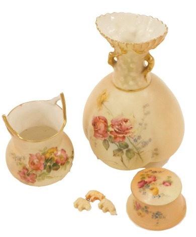 Three items of Royal Worcester blush ivory, comprising a floral painted vase, with purple Worcester stamp to underside, 16cm high, two handled pale, 10cm high, and a trinket box, 4cm high. (3)