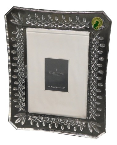 A Waterford crystal photograph frame, fits photo size 4' x 6', 22cm x 16cm, in original fitted box with packaging.