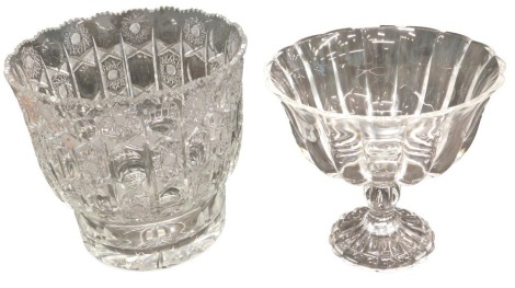 A cut glass centrepiece or bowl, with elaborate decoration of roundels, etc., 24cm diameter, and a pedestal glass bowl. (2)