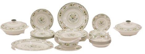 A 19thC F&R Pratt and Co Fenton dessert set, with printed design of figures within buildings, landscapes, etc., on a green marbled ground, comprising oval stand, and eight plates, some pieces possibly associated.