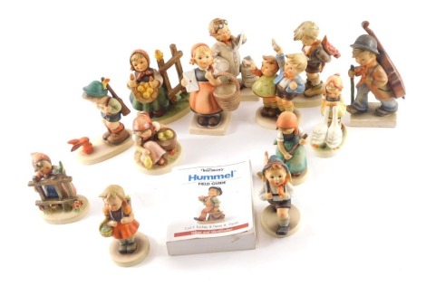 A quantity of Goebel Hummel figures, to include figure with cello, doctor, boy with terrier, etc.