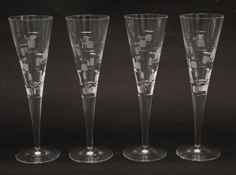 A set of Royal Doulton champagne glasses, each with geometric design, in fitted box.