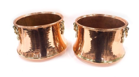 A pair of Eastern copper and brass two handled log baskets or coal buckets, with lacquered finish, the tops 34cm diameter.