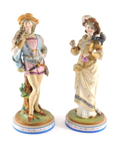 A pair of late 19thC German bisque porcelain figures, of a gentleman with a falcon and a lady with a black squirrel, 33cm high.