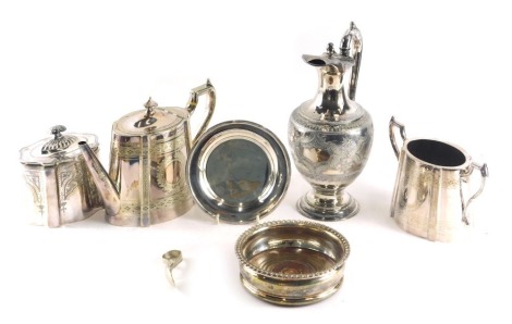 A quantity of silver plate, to include a claret jug with engraved decoration, and a Britannia metal four piece tea set.