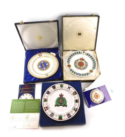 Three commemorative plates, a Spode limited edition plate for Salisbury Cathedral, another for The Royal Scots Regiment, and a Royal Canadian mounted police plate, all in original fitted boxes with some literature.