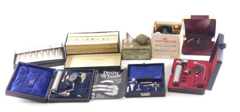 A quantity of medical instruments, to include a reflector scope, microscope slides, etc.