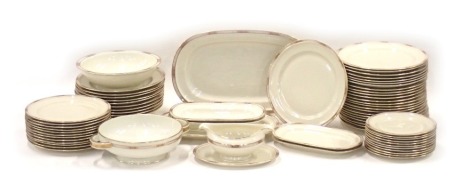 A Rosenthal Winifred pattern dinner service, with geometric gold borders, to include tureen, double ended sauce boat, oval meat dishes, etc.