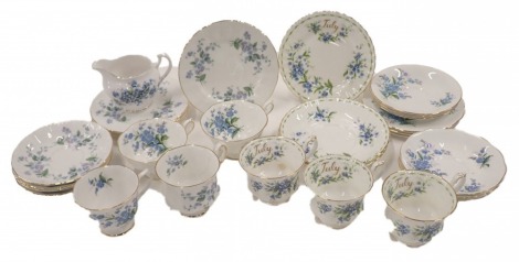 A Paragon Forget me Not pattern part china service, and a similar Royal Albert service.