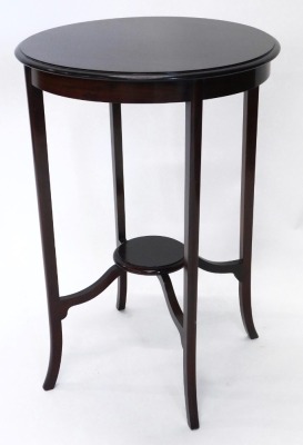 An Edwardian mahogany two tier table, on splayed legs, and a stained beech plant stand on brass feet. (2) - 2