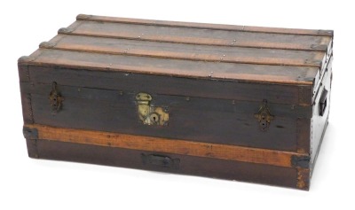 A late 19th/early 20thC beech canvas and metal cabin trunk, with side handles, 82cm wide.