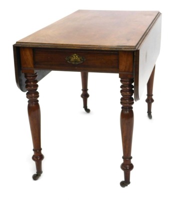 A Victorian mahogany Pembroke table, the rectangular top with rounded corners and a moulded edge above a frieze drawer, on turned legs with castors, 110cm wide.