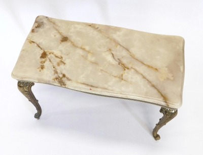 An onyx and gilt metal coffee table, the rectangular shaped top with a moulded edge on cabriole legs, 66cm wide. - 2