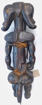 An African tribal Fang three headed reliquary figure, with rope bindings, associated metal mounting spike, Gabon circa 1935, 60cm high. - 2