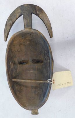 An African tribal Baule crescent mask, Cote D'Ivoire, circa 1965, 42cm high. - 2