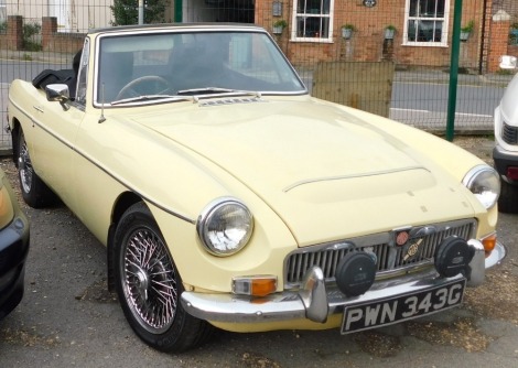 A 1968 MGC Roadster convertible, registration PWN 343G, in pale primrose yellow, with rare Lenham drophead conversion, renovated in 1997-1998 by Roger Taylor Classic Cars of Bournemouth and fitted with walnut dash and leather interior, recorded mileage 49