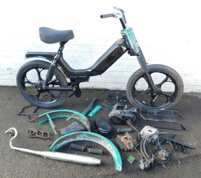 A Tomos Moped and parts, no paperwork present.