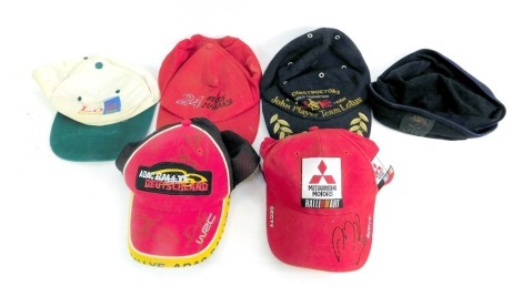 Various signed and unsigned hats, including a Scott USA Mitsubishi Motors rally art cap signed by Colin McRae, an ADAC Rallye Deutschland WRC cap signed by Daniel Sola, Roman Crester, and Tony Gardemeister for WRC drivers 2005, a John Player Team Lotus Ca