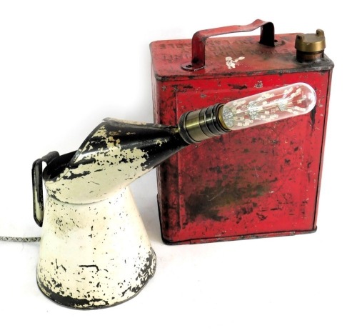 A Shell petrol can, together with an oil can converted to a table lamp.