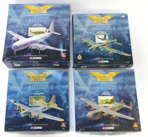 Four Corgi Aviation Archive diecast models, 1:144 scale, from the Miltary Series, comprising B117G Flying Fortress, Avro York RAF King's Flight, Boeing C-97G Delaware Air Guard, and Avro Lancaster Mickey The Moocher Battle of Britain Memorial Flight, boxe