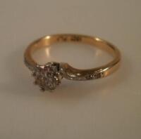 A diamond solitaire ring