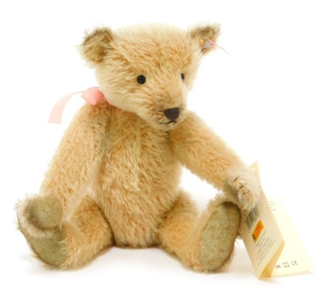 A Steiff mohair Teddy bear, Appolonia Margarete, serial number 038136, with tag, 27cm high.