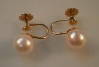 A pair of cultured pearl screw back stud ear-rings