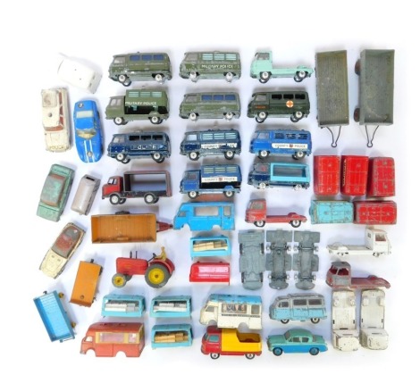 A group of diecast vehicles, play worn, to include Corgi Commer three quarter tonne chassis, police cars, Army ambulance, a Dinky Toys tractor, etc. (1 tray)