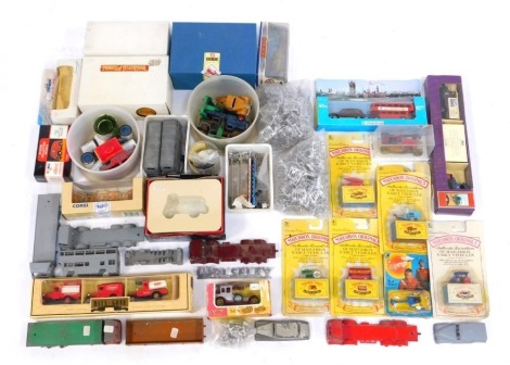 A group of diecast vehicles, to include a Lledo Railway Express parcel van, Days Gone, Matchbox Originals, empty boxes, car parts, etc. (1 box)