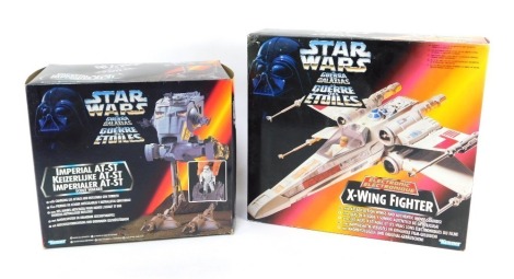 Two Kenner 1990s Star Wars figures, to include Imperial ATST, and X Wing Fighter, boxed. (2)